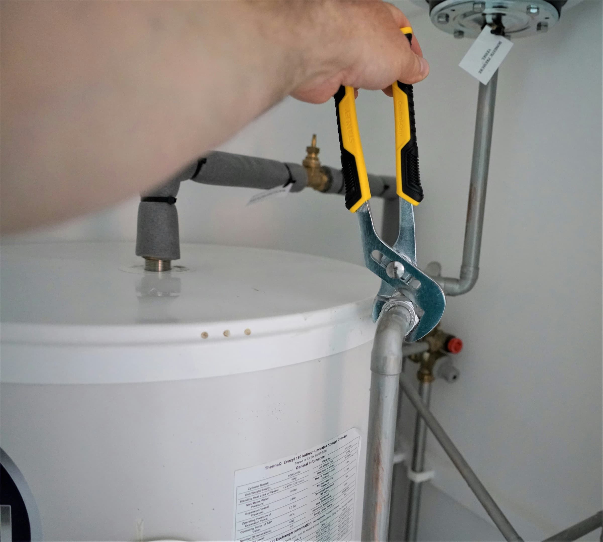 Tightening a fitting on a water heater